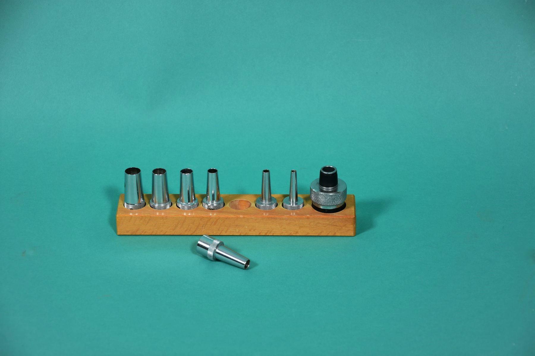 1 set of tube adapters in wooden stand, used